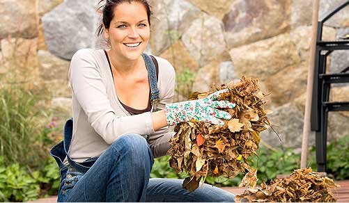 Woman cleaning yard